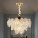 Tiered Textured Glass Leaf Chandelier styled in a cool hotel interior