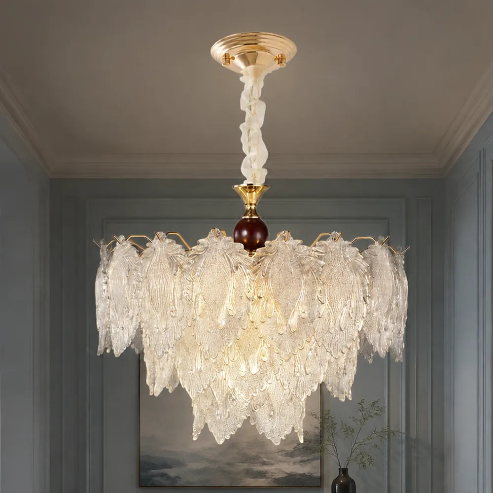 Tiered Textured Glass Leaf Chandelier styled in a cool hotel interior