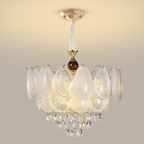 Oval clear and frosted glass chandelier with a crystal drop cascade
