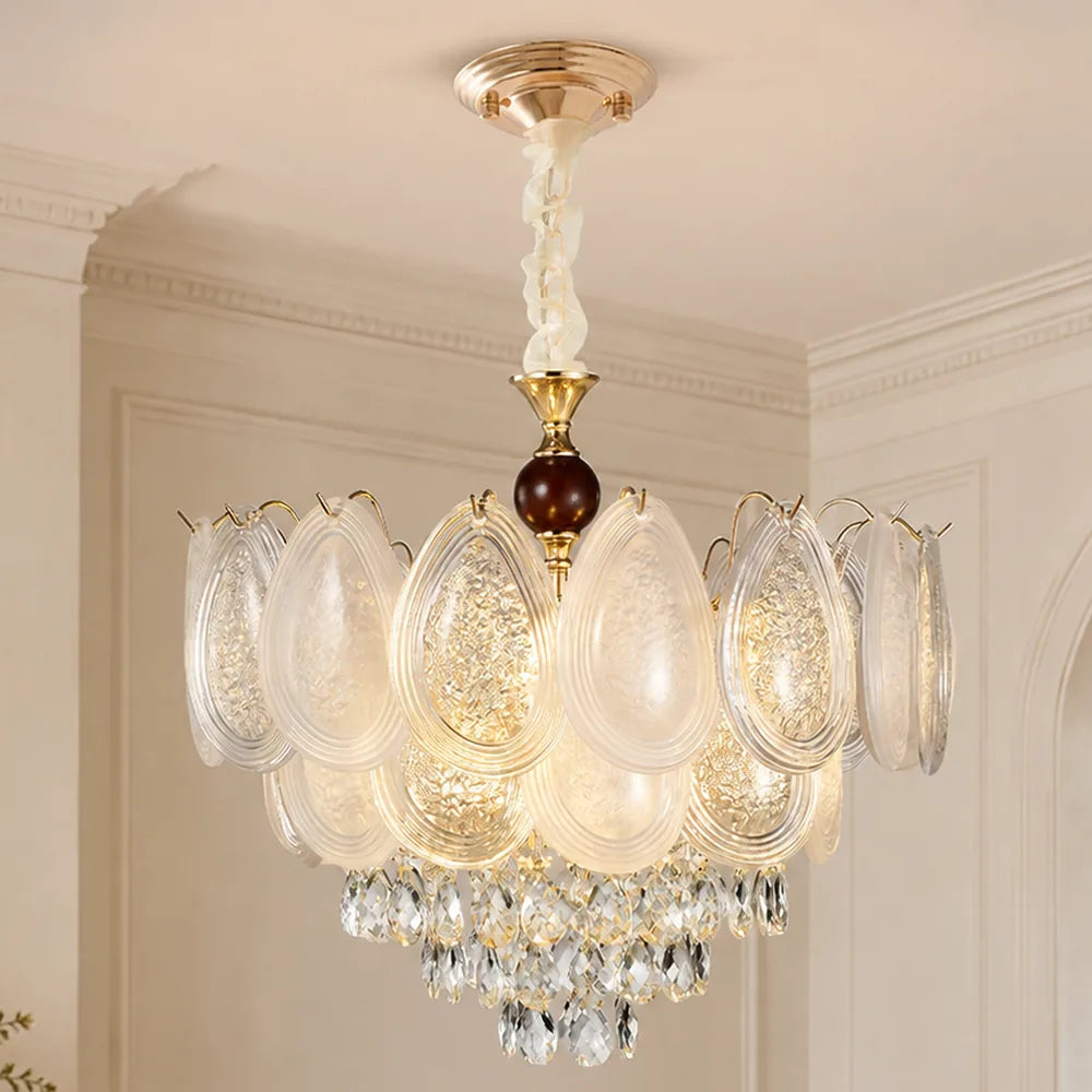 Oval Glass Chandelier with Crystal Cascade styled in a warm ivory interior