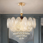 Oval Glass Chandelier with Crystal Cascade styled in a cool hotel interior
