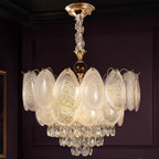 Oval Glass Chandelier with Crystal Cascade styled in a deep plum interior