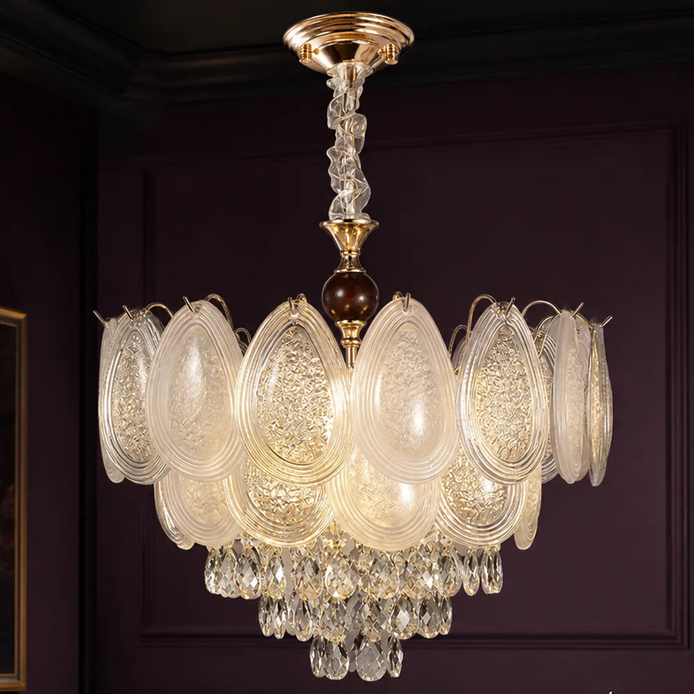 Oval Glass Chandelier with Crystal Cascade styled in a deep plum interior