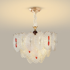Textured rosette glass chandelier with ruby-toned faceted accents