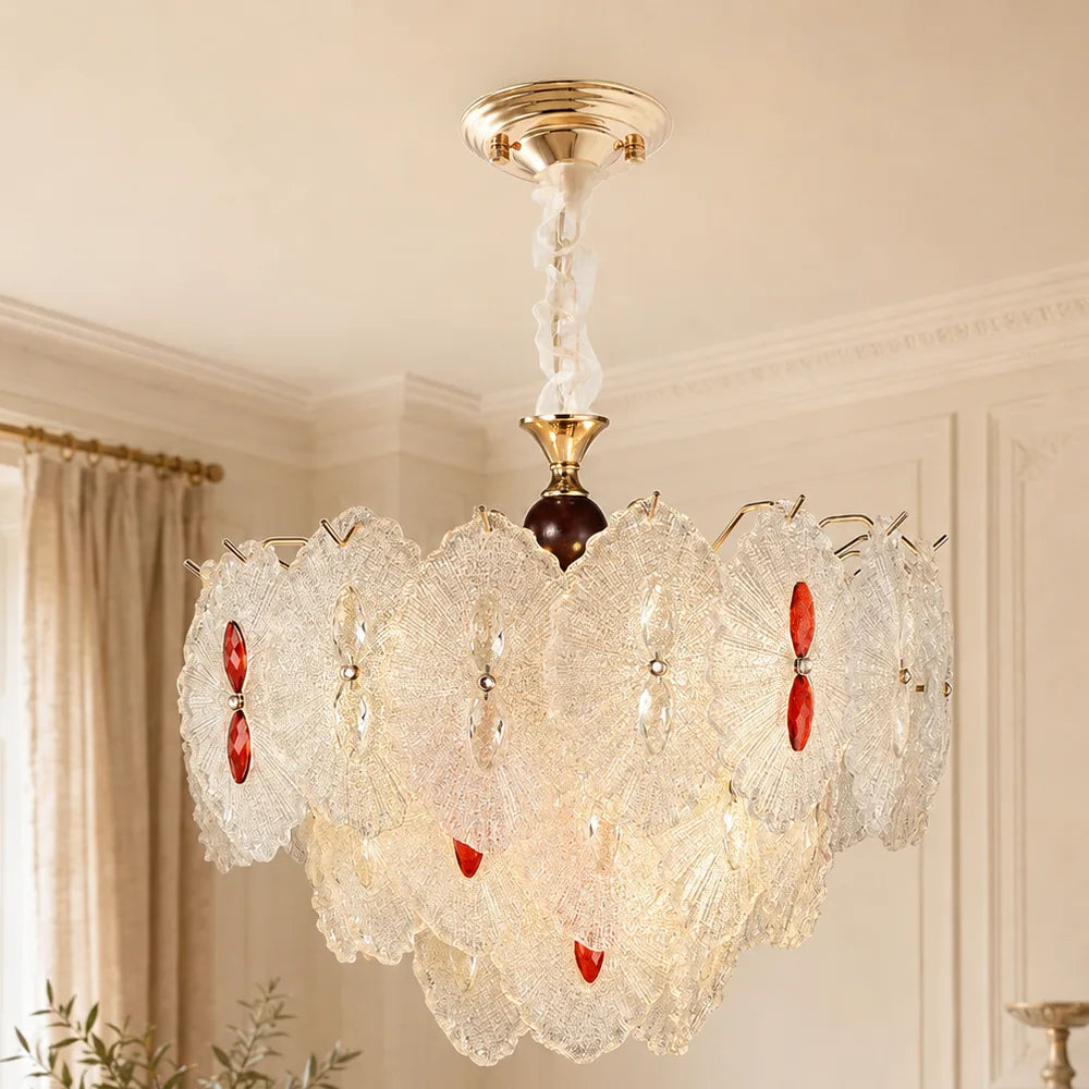 Rosette Glass Chandelier with Ruby Accents styled in a warm ivory interior