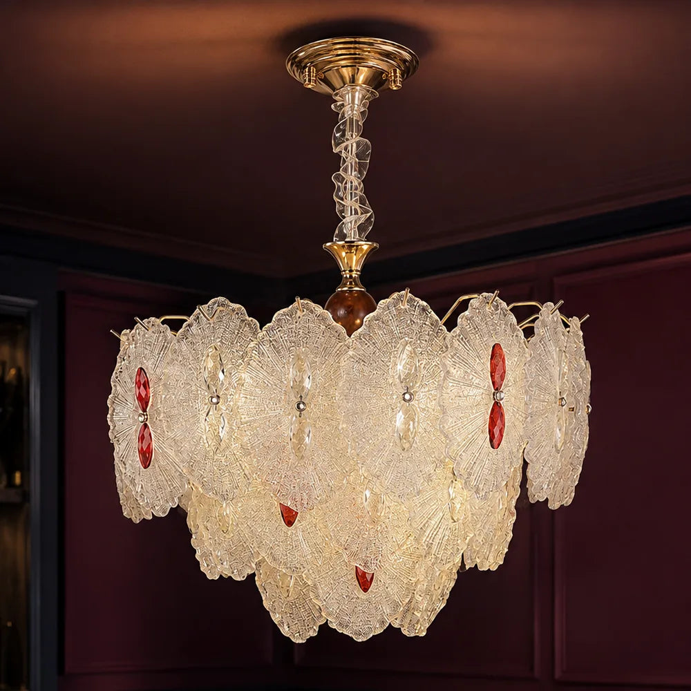 Rosette Glass Chandelier with Ruby Accents styled in a deep plum interior