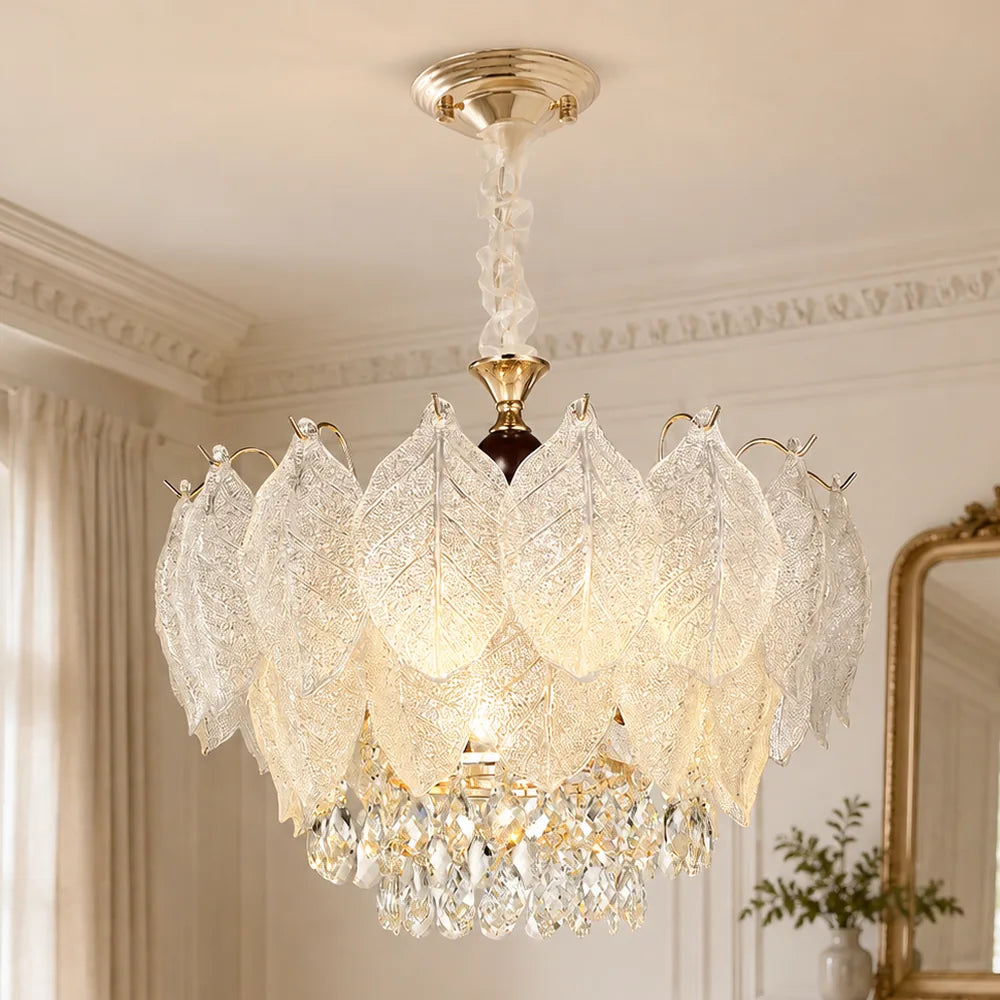 Layered Glass Leaf Chandelier with Crystal Drops styled in a warm ivory interior
