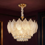 Layered Glass Leaf Chandelier with Crystal Drops styled in a deep plum interior