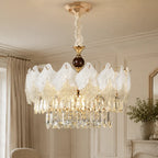 Frosted Petal Chandelier with Crystal Fringe styled in a warm ivory interior