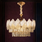 Frosted Petal Chandelier with Crystal Fringe styled in a deep plum interior