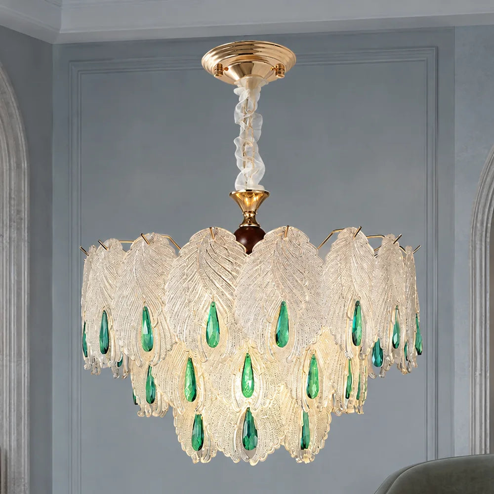 Glass Leaf Chandelier with Emerald Drops styled in a cool hotel interior