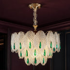 Glass Leaf Chandelier with Emerald Drops styled in a deep plum interior