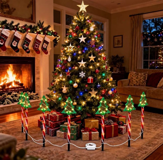 Red tube Christmas tree silhouette stake light glowing warm white outdoors - product shot